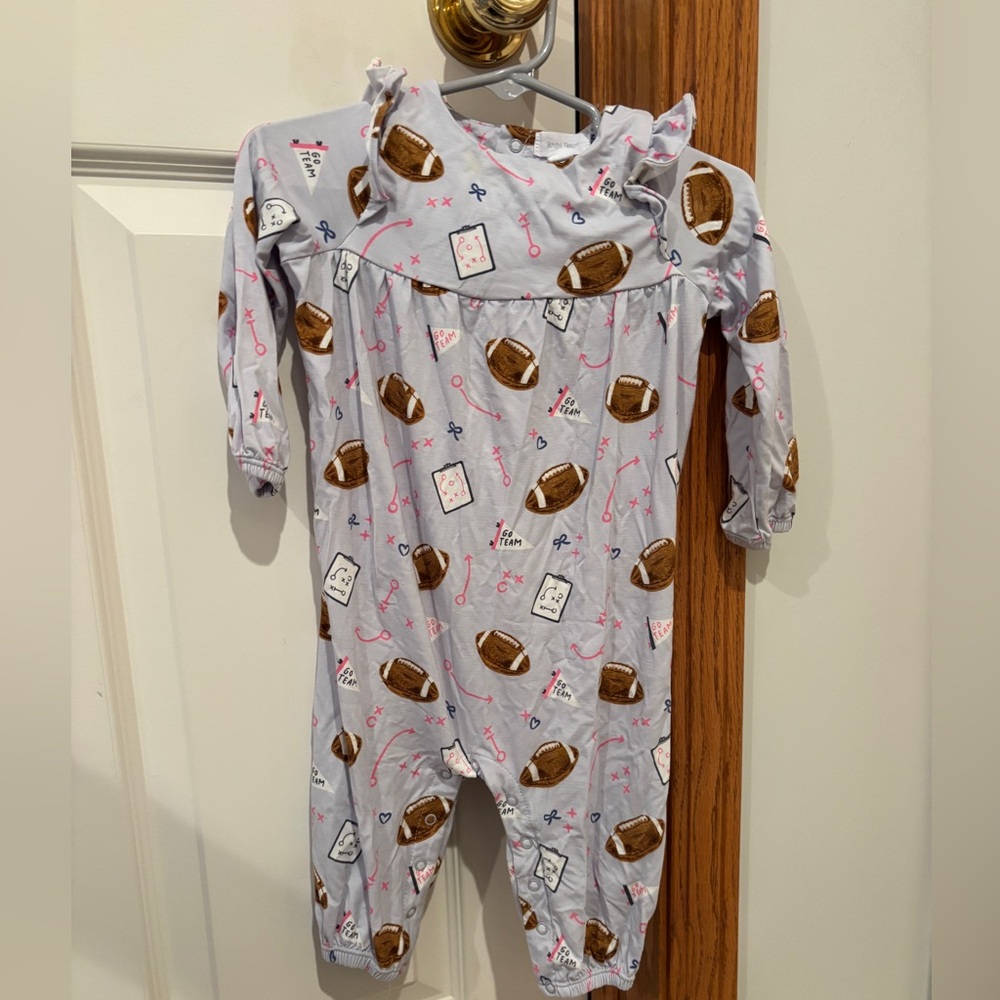Football romper with ruffle detail